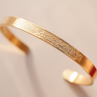 Gold Patience is the Key to Relief Cuff Bangle – Islamic Jewellery: Elegant gold cuff bangle inscribed with "As-Sabr Miftah Al-Faraj" in Arabic, symbolizing patience and relief. Perfect Islamic gift for women, crafted from 18K gold-plated stainless steel.