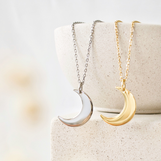 Close-up of Hilal Necklace crescent moon design, handcrafted with stainless steel and 18k gold plating.