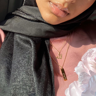 Model wearing Allah Necklace, a meaningful Islamic jewelry piece perfect for daily wear.