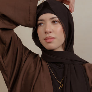 Model wearing Patience Necklace, a meaningful Islamic jewelry piece symbolizing resilience and strength